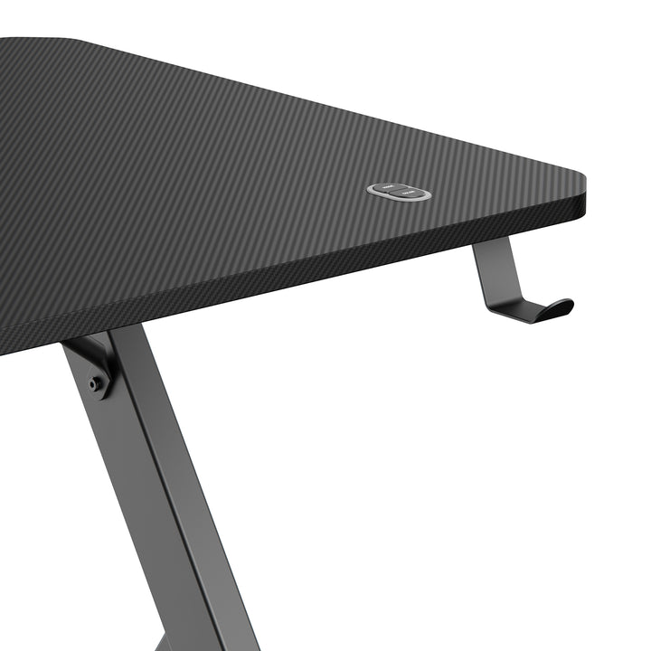 NanoRS játékasztal, fekete, fejhallgató- és pohártartóval, RGB háttérvilágítással, max. 75kg, méretek 1200x600x750mm, RS102