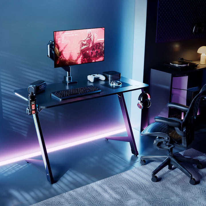 NanoRS játékasztal, fekete, fejhallgató- és pohártartóval, RGB háttérvilágítással, max. 75kg, méretek 1200x600x750mm, RS102